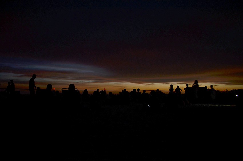 Crowds line a caution-tape barrier on Siesta Key for the annual fireworks show. The Siesta Key Chamber of Commerce fireworks began just after 9 p.m. on Siesta Key Beach.