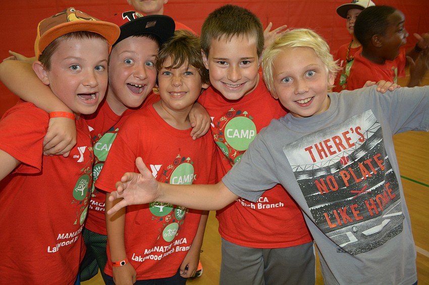 Braden River Elementary students Chase and Quinn Kauffold play with Tomas Garcia, Nate Bentze and Tucker Ritchey.