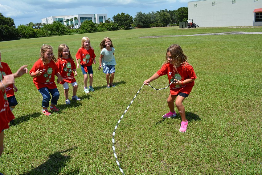 Dani Mallitz, 6, wields the jump rope in a game of 