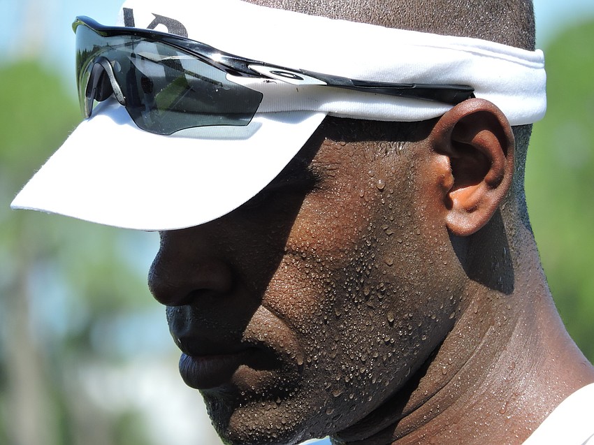 Angel  Fournier Rodriguez breaks a sweat in the hot, humid conditions Friday at Benderson Park he hopes will prepare him to better his seventh-place finish at the 2012 Summer Olympics in single sculls.