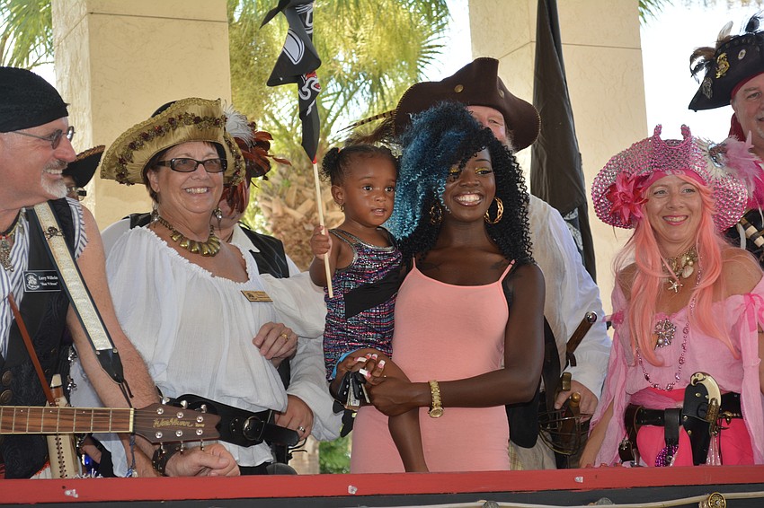 Bradenton's Marlie Haynes, 2, and mom, Monique Mitchell, enjoy some pirates' company.