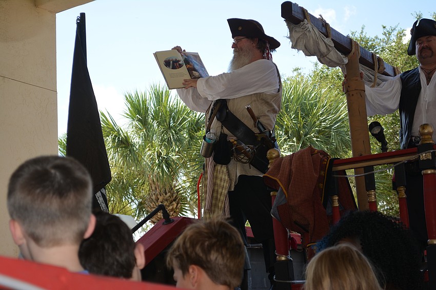John Swager gets his turn to read to his new shipmates.