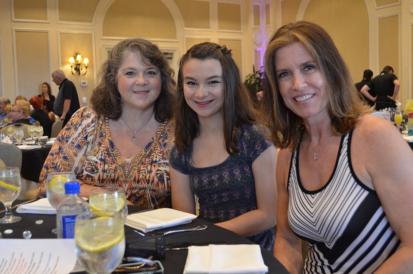 Antoinette and Olivia Yagy with Suzanne Thomas.