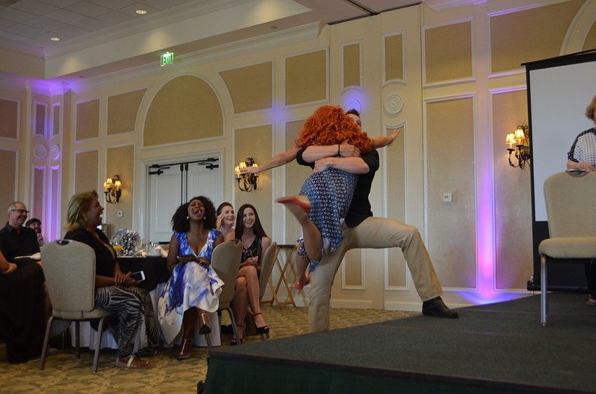 Eric Martsolf lifts Patsy Pease as part of their “unrehearsed” performance of “Part of Your World” for Samantha Bozza, who is a big fan of The Little Mermaid.