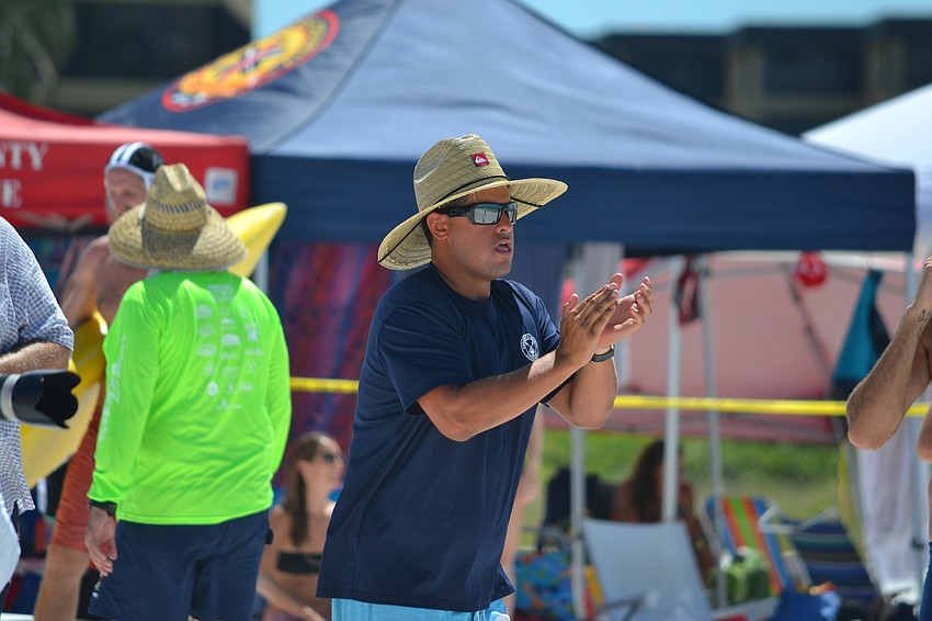 Event organizer Drew Bittle cheers on Sarasota County teams during the competition.