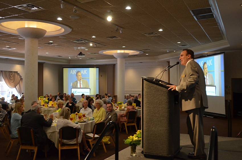 Brian Lipton explains AJC’s mission to fight anti-Semitism. According to Lipton, the recent AJC Global Forum attracted 168 people from Sarasota, making the group the third largest delegation.