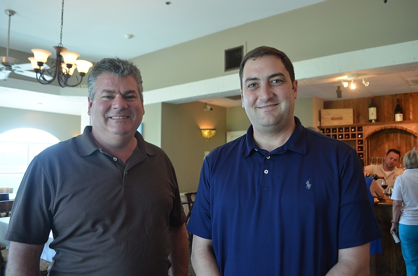 Bill Herlihy and Eric Fleishman of Bridge Street Bistro, the host of the event.
