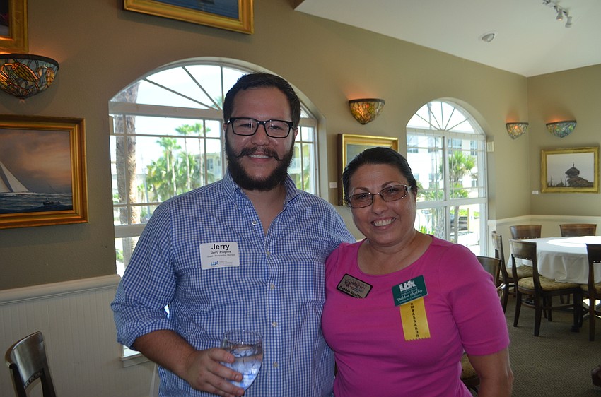 Jerry Pippins of Gigi’s Cupcakes and Chamber Ambassador Debbie Shaffer of Veteran Air