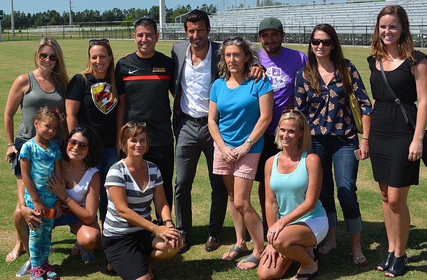 Even the parents were able to pose for a photo with soccer legend Luis Figo.