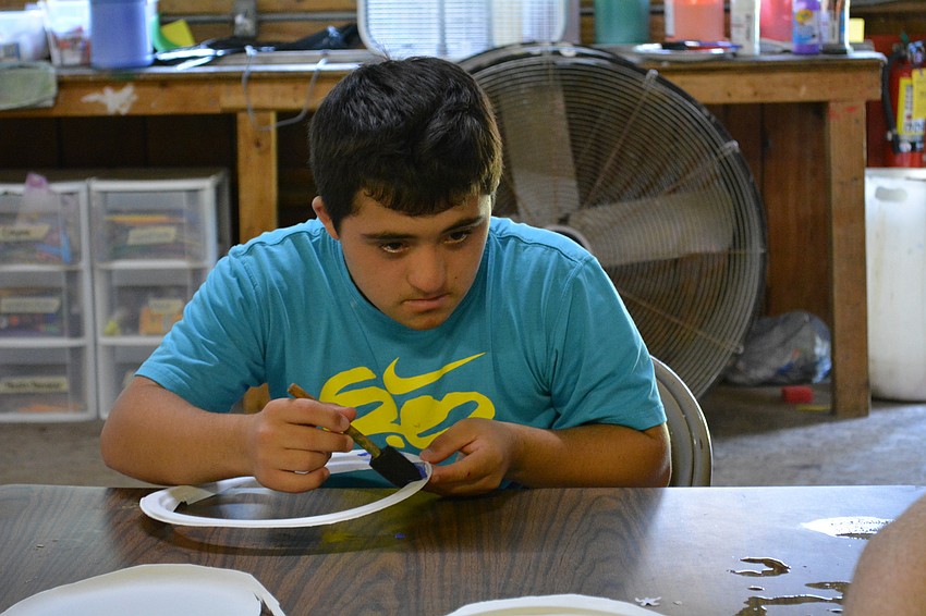 Camper Brandon Wheeler, 13, attends camp for the firs time this year.