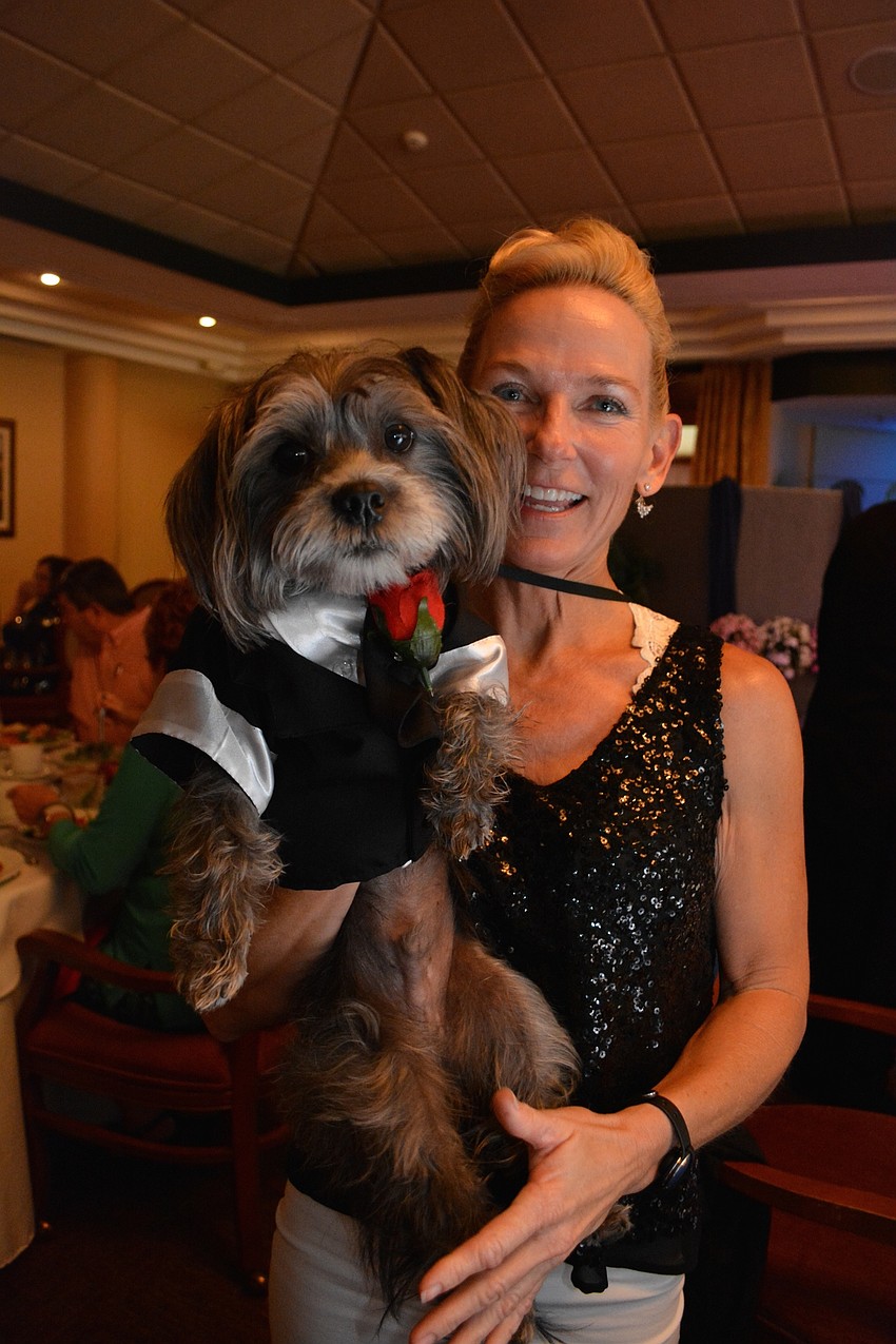 Marcel, owned by Tracy Lamb, quickly became the evening's mascot. 