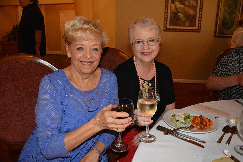 Lorraine Murphy joins friend Judy Egan, of Longwood Run, who came to watch a student she mentors, Nicole Smith, not pictured.