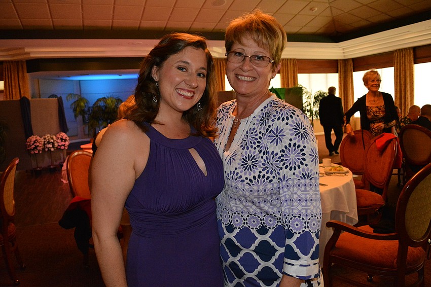 Performer Jessica Hollick Dvoracsek laughs with her mom, Kathy Hollick, before the performance.