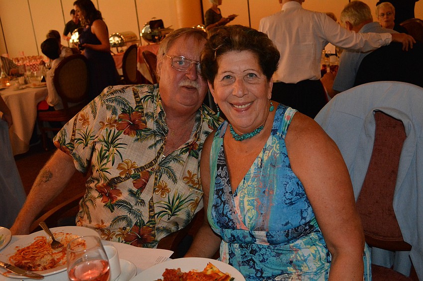 Gary Ward poses with his wife Genie Polower, a 69-year-old opera student.