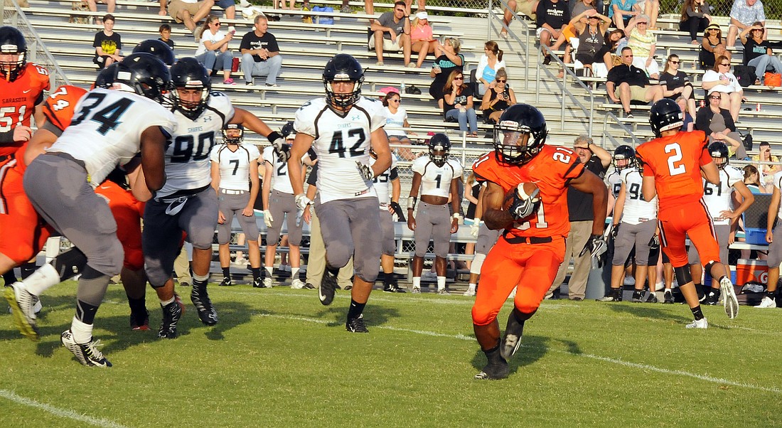 Sarasota running back JaQuan Johnson and his Sailors teammates will participate in the 1st annual Pre-Season Sarasota County High School Football Team Showcase, at 5:30 p.m. Aug. 10., at the Robert Taylor Complex.