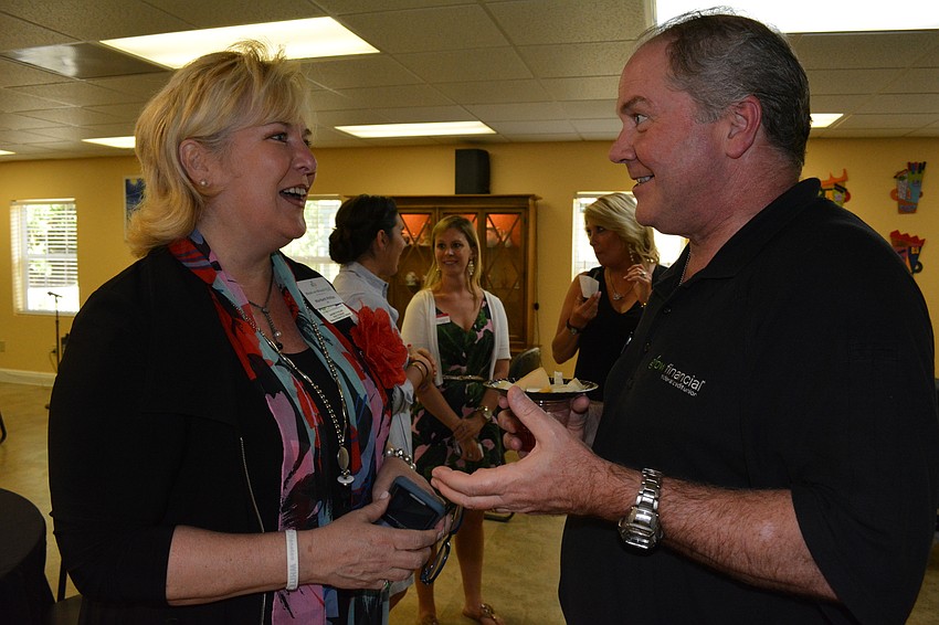 Meals on Wheels PLUS CEO Maribeth Phillips catches up with Tom Cofer, of Grow Financial Credit Union.
