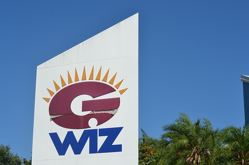 The worn-out sign at the entrance of the property is one of the first signals that the building is suffering from a lack of maintenance.