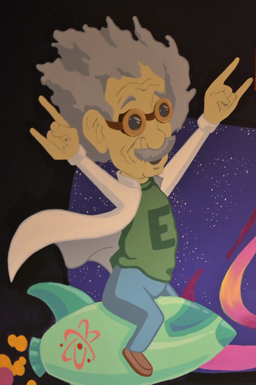 Science-related murals remain painted throughout the building.