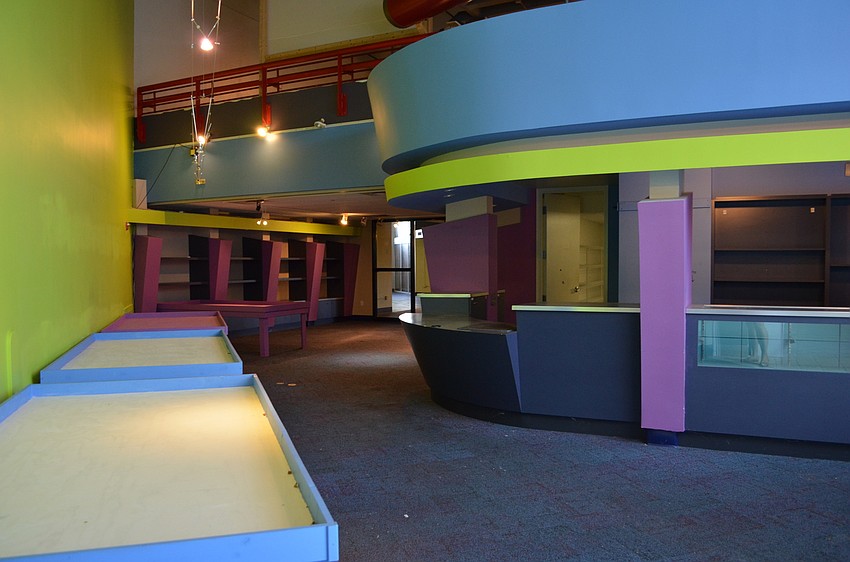 The main lobby still bears the vibrant colors that make the building stand out as a former children's museum.