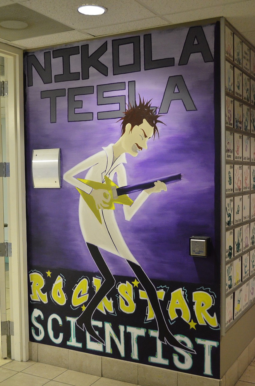 The walls bear smaller details in some areas, and large-scale paintings elsewhere.