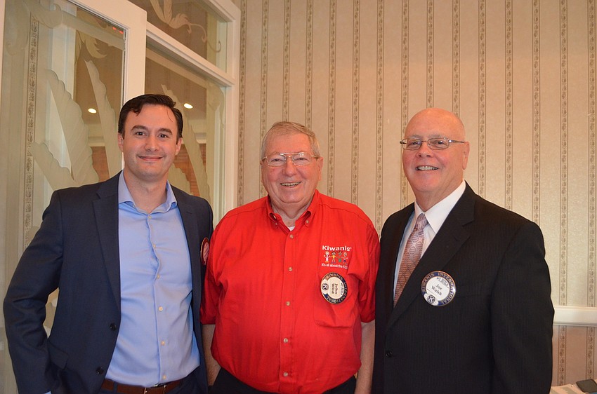 Dominic Mazzarella, Kiwanis Club Secretary John Wild and President Joe Walsh