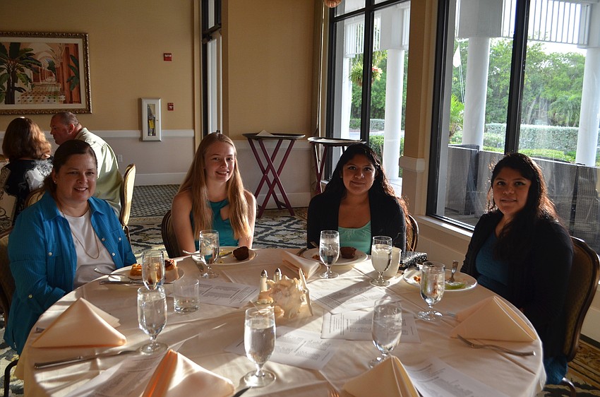Ann Downer and scholarship recipients Katelyn Downer, Liliana Acosta and Maria Acosta