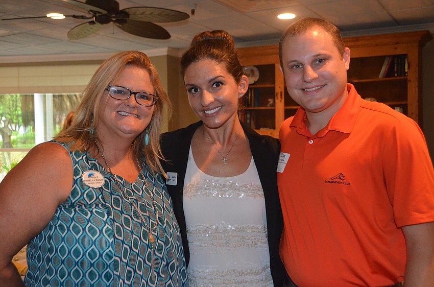 Pamela Hagan of Waterfront 7 Realty, Samantha Krol of Gulfshore Insurance and Dab Vignola of The Resort at Longboat Key Club