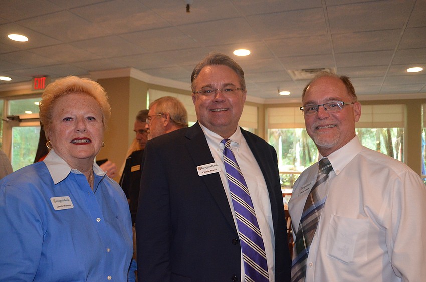 Lynette Williams, CEO Charlie Brown and Russell Robbins all of Insignia Bank, the event sponsor.