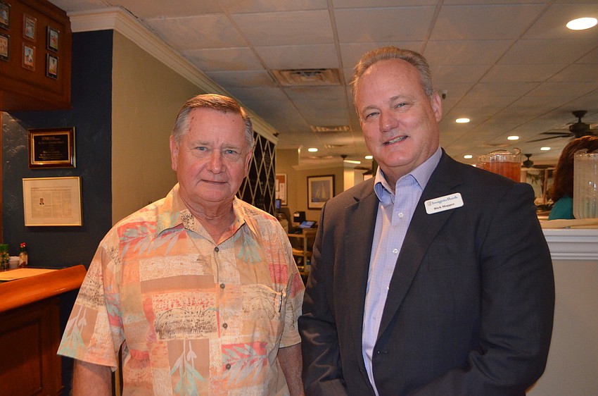 Dan Alderson of Tyler’s Ice Cream and Rich Hopper of Insignia Bank