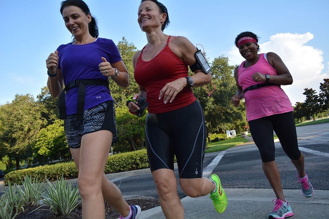 Sharon Smythe (purple),  Monica Hall (red) and Miriam Gregory (pink) complete their Saturday morning run with the Lakewood Ranch Running Club.