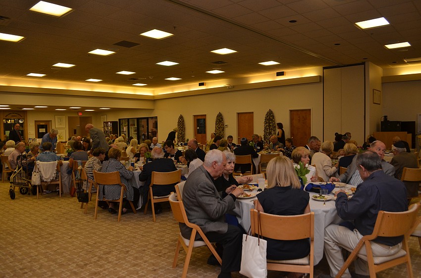 Congregation members and guests gathered for dinner following Rabbi Sniderman’s first service.