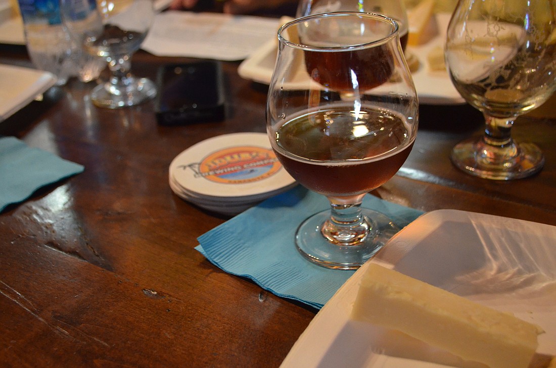 The first beer of the night was JDub's Xolo, a Vienna amber lager, paired with the Basque etorki  cheese. Photo by Niki Kottmann.