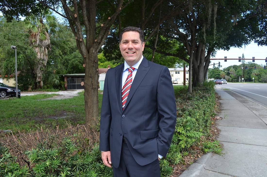 The property at Fruitville Road and East Avenue isn't much to look out now, but Michael Infanti is one of the developers hoping to revitalize a long-dormant district.