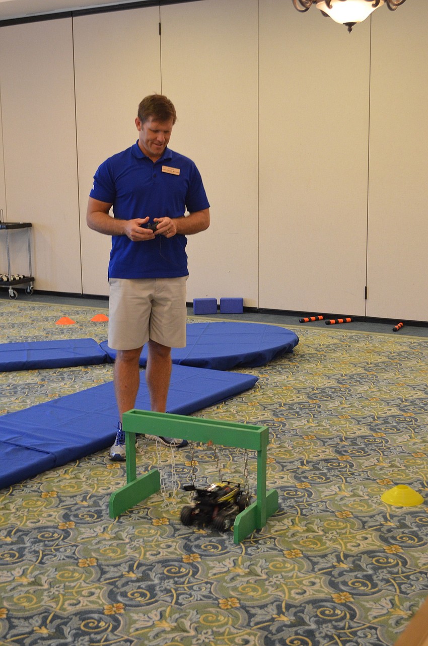 Fitness Center Manager Andre LeClair gives a demo for the course.