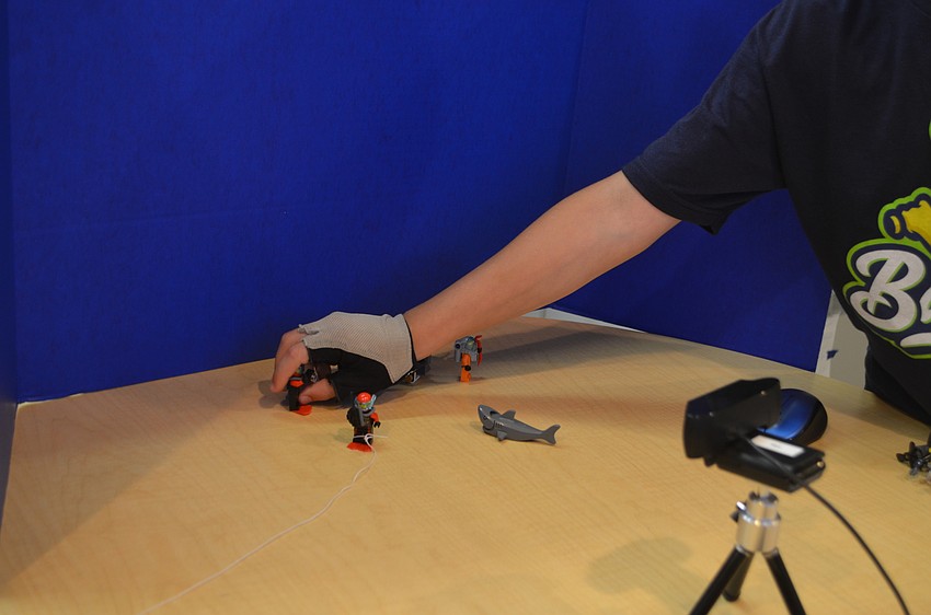 Campers used Lego pieces and blue cardboard to shoot stop motion videos during Mote Marine Laboratory and Aquarium’s Aqua Tech camp.