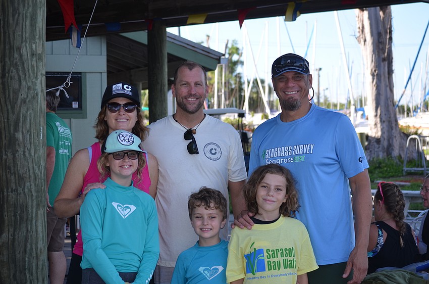 Lila Saarinen, 9, Jude Saarinen, 6, and Liliana Janneman, 9, with Emily Saarinen, Justin Saarinen, and Rene Janneman in back.