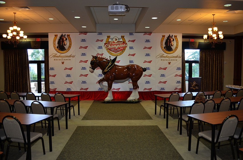 A statue of the iconic Budweiser Clydesdale served as the centerpiece for the room where the ring ceremony took place.