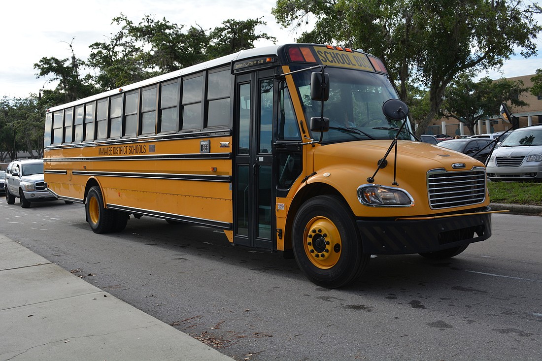 Buses pick up students from high school, then elementary and then middle schools each day.