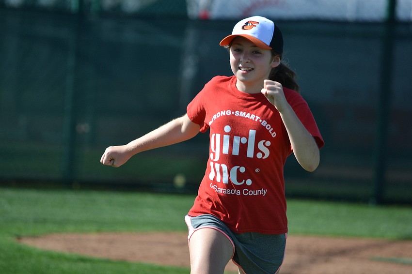 Rachel runs the bases on one of the practice fields.