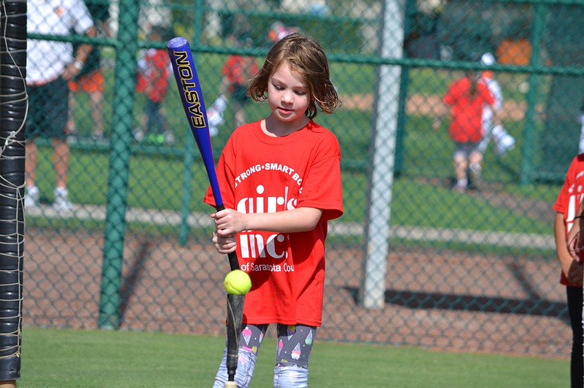 Ruby steps up to the plate to swing.