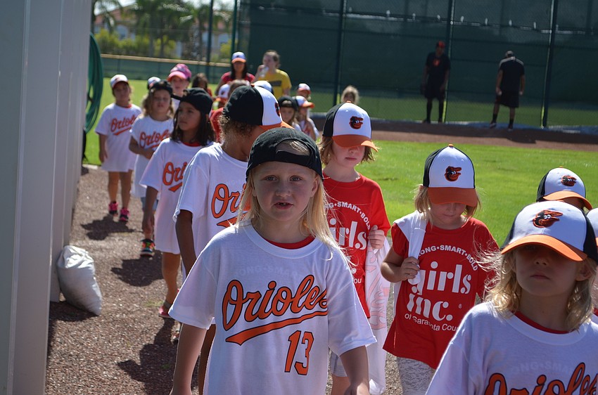 Girls ran the bases, pitched to players and swung for the fences during the clinic with the Baltimore Orioles Tuesday, Aug. 16 at Ed Smith Stadium.