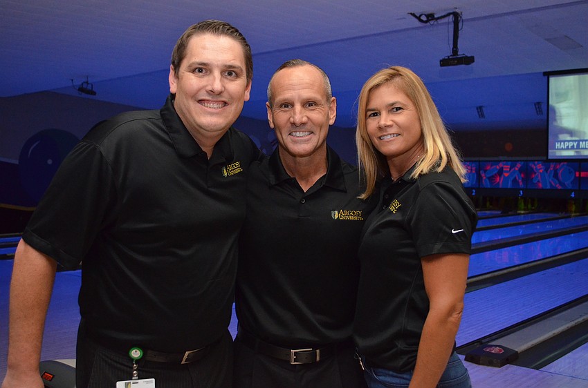 The team representing Argosy University includes Jonathan Miller, Jeff and Natalie Day.