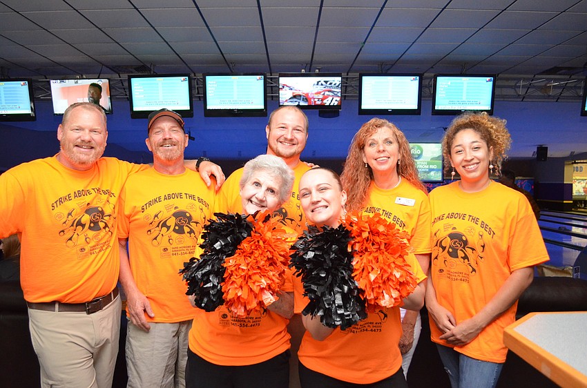 The Comfort Suites Sarasota team includes Chris and Jerry Govaars, Tony Davidson, Laurie Pike, Elani Smith with cheerleaders Judy Holt and Patricia Aylward.