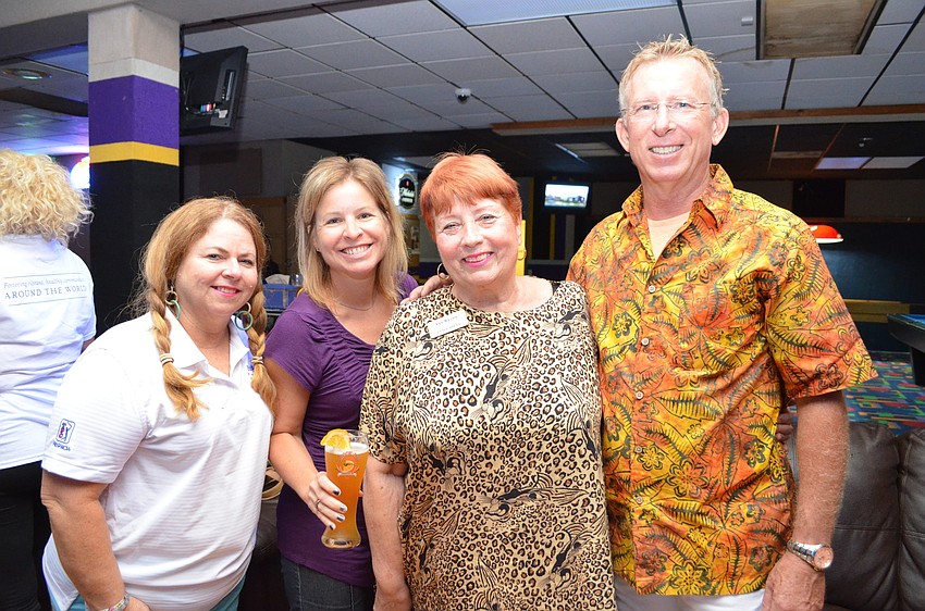 Sharon LItchfield, TPC Prestancia, Becky Brantner, Purple Monkey Print and Design, Janet Arena, Van Wezel Performing Arts Hall and Greg Hayes, Merchant Services joined forces as the Suicide Squad.