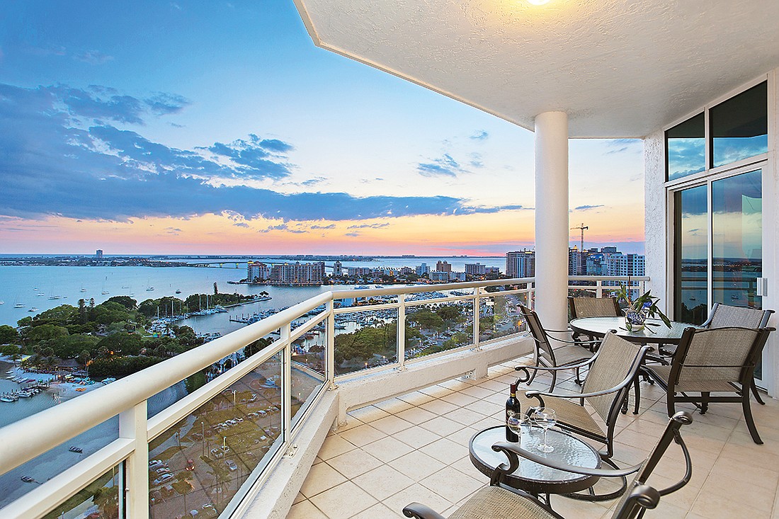 A perfect Sarasota sunset from the Kalin penthouse, located in Sarabande on Palm Avenue. The view extends over the marina, past the keys and out to the Gulf of Mexico.