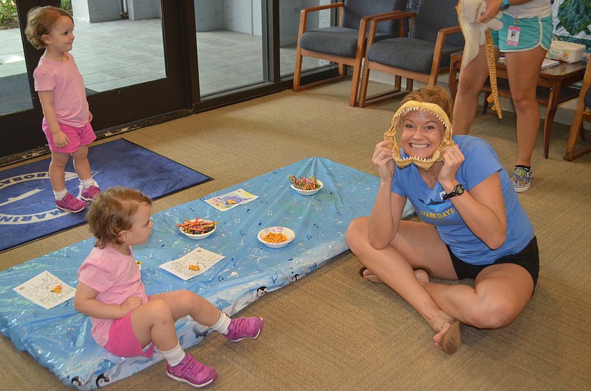 Mandy Wrobel, Senior Public Program Coordinator for Mote, goofs around during a Mommy and Me session.