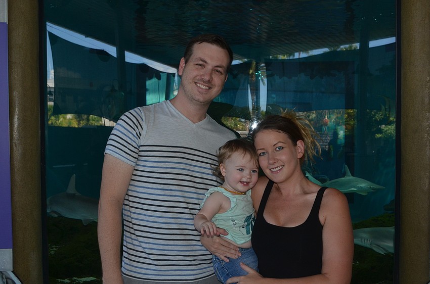 Adam Seevers with daughter Ryleigh, 17 months, and wife, Jackie