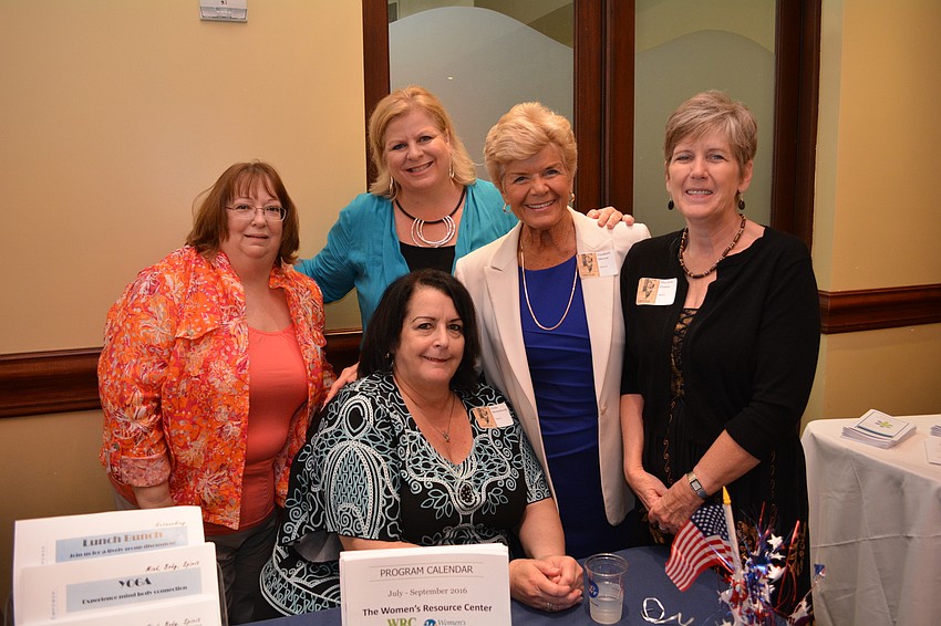 Staff of the Women's Resource Center have a booth. Pictured clockwise from front, sitting are: Linda Mickelberg, Cheryl Herbold, Ashley Brown, Elizabeth Mercer and Marjorie Chavez.