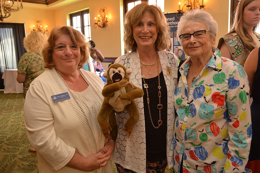 Rose Chapman, CEO of Jewish Family and Children's Service of the Suncoast, is supported by Marion Marshak, of the National Council of Jewish Women, and Marilyn Harlwell, of Sarasota.