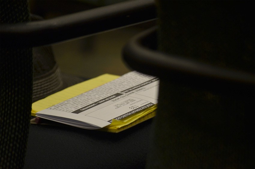 Many in attendance brought sample ballots to the panel to take notes during discussions in preparation for the August 30 primary.